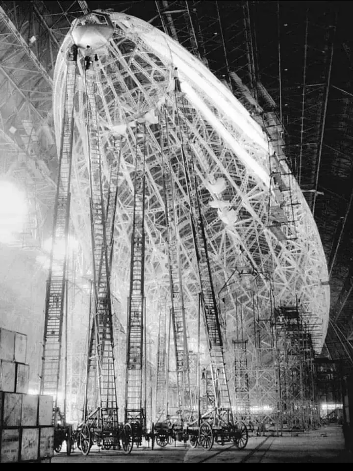 image of a rigid body airship being built (a zeppelin, technically a US airship)